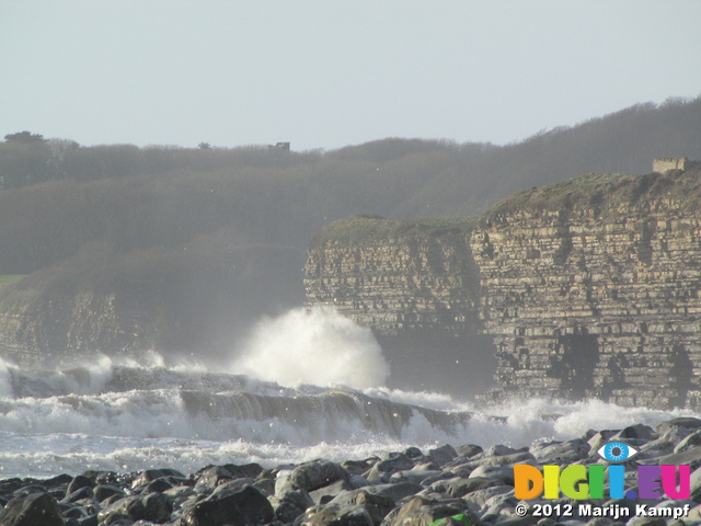 SX21204 Waves crashing at cliffs by Llantwit Major beach